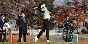 Nishimura demonstrates her iron shot