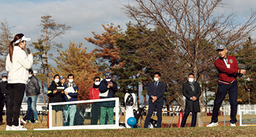 Nishimura gives detailed advice to participants